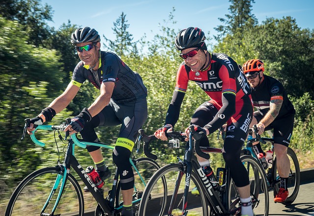 3 Cyclists on bikes