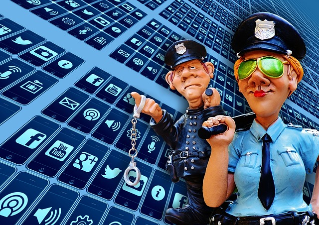 police figures in front of social media icons