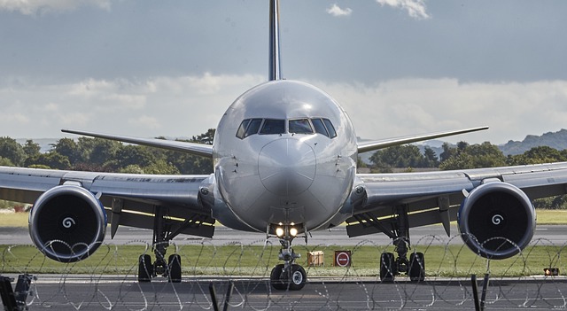 Laptops and tablet computer banned on flights Aeroplane at departure gate