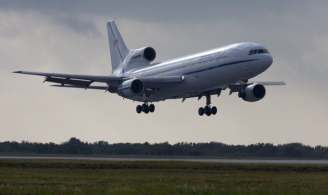 Aircraft landing on runway