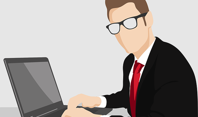 Alphabay admin arrested in Thailand man typing on computer